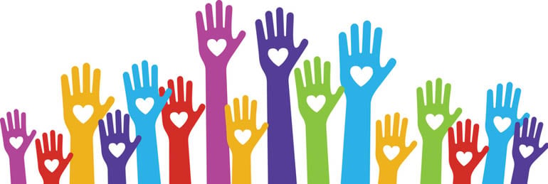 Arms in the air of different colours and with a love heart in the palm of each hand