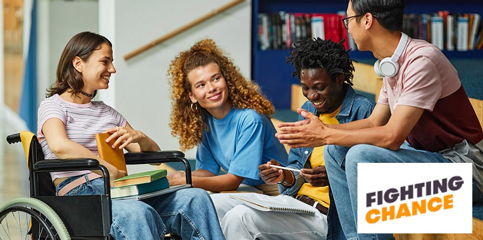 Group of young people chatting, one in a wheelchair