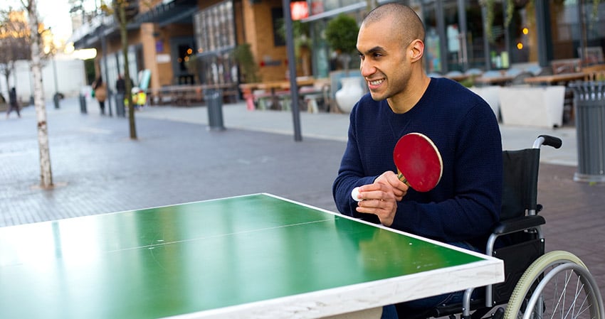 Young man playing table tennis