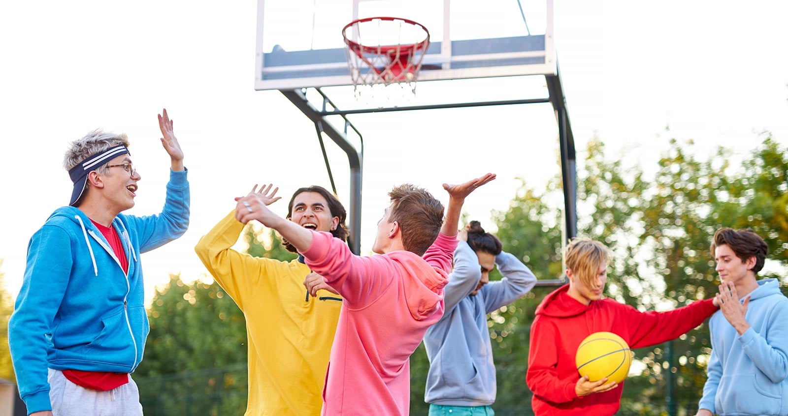Boys playing basketball