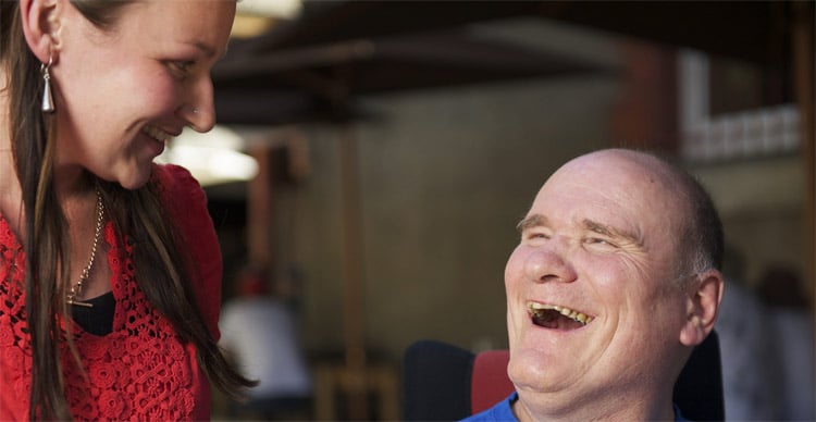 man laughing with a woman